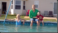 foot in pool with kids